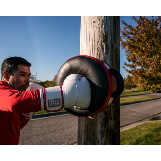 Маківара кругла TITLE Boxing Wrap-Around Stationary Punch Shield Black/Red