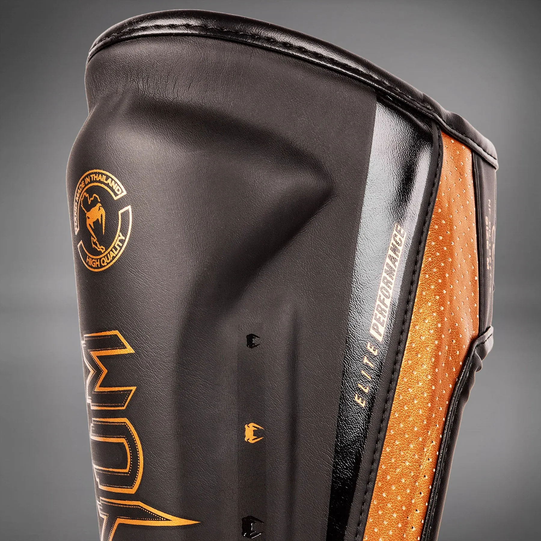 Защита ног Venum Elite Evo Shinguards Black/Bronze-M